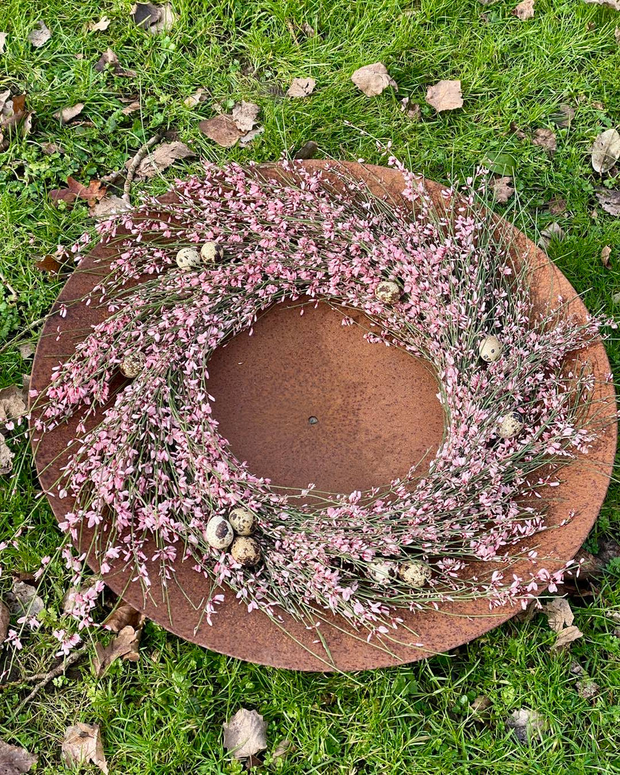 Cortenstaal & Bloemen — stoer en zacht in één beeld