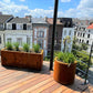 Cortenstaal bloempotten op terras