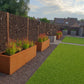Tuin met plantenbakken in cortenstaal